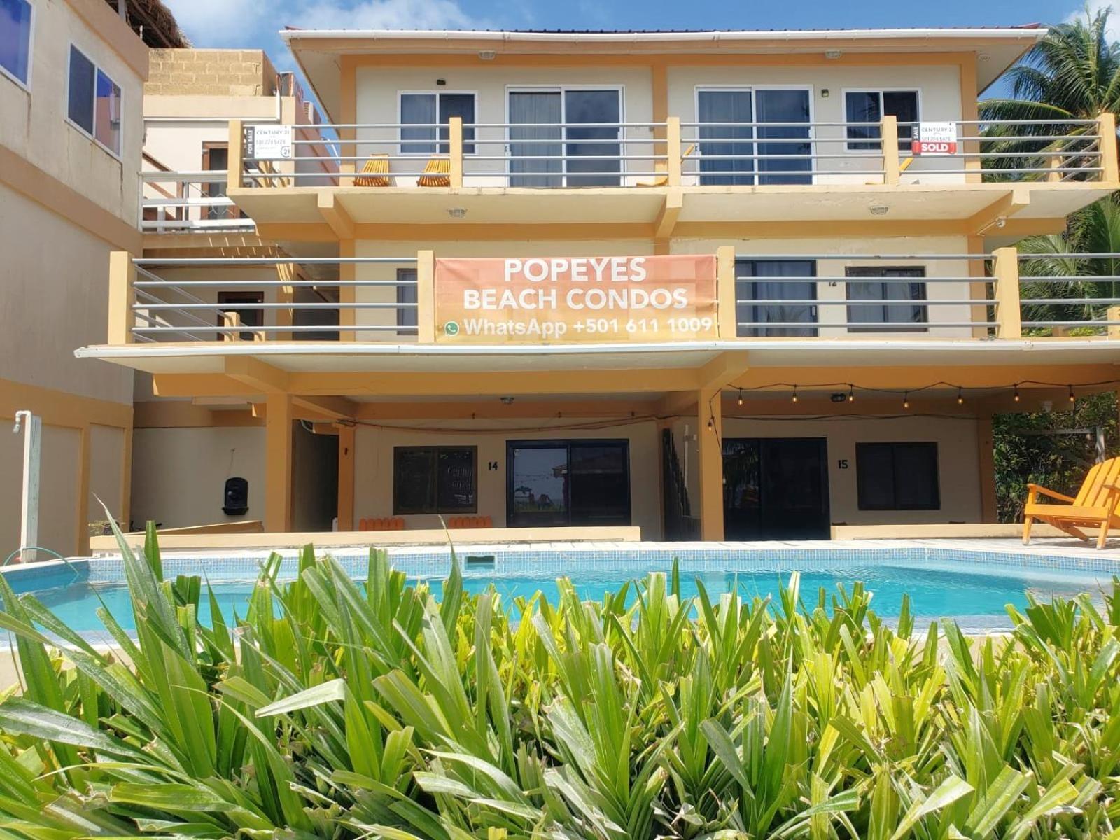 Beach Club Budget Rooms At Popeyes Caye Caulker Esterno foto