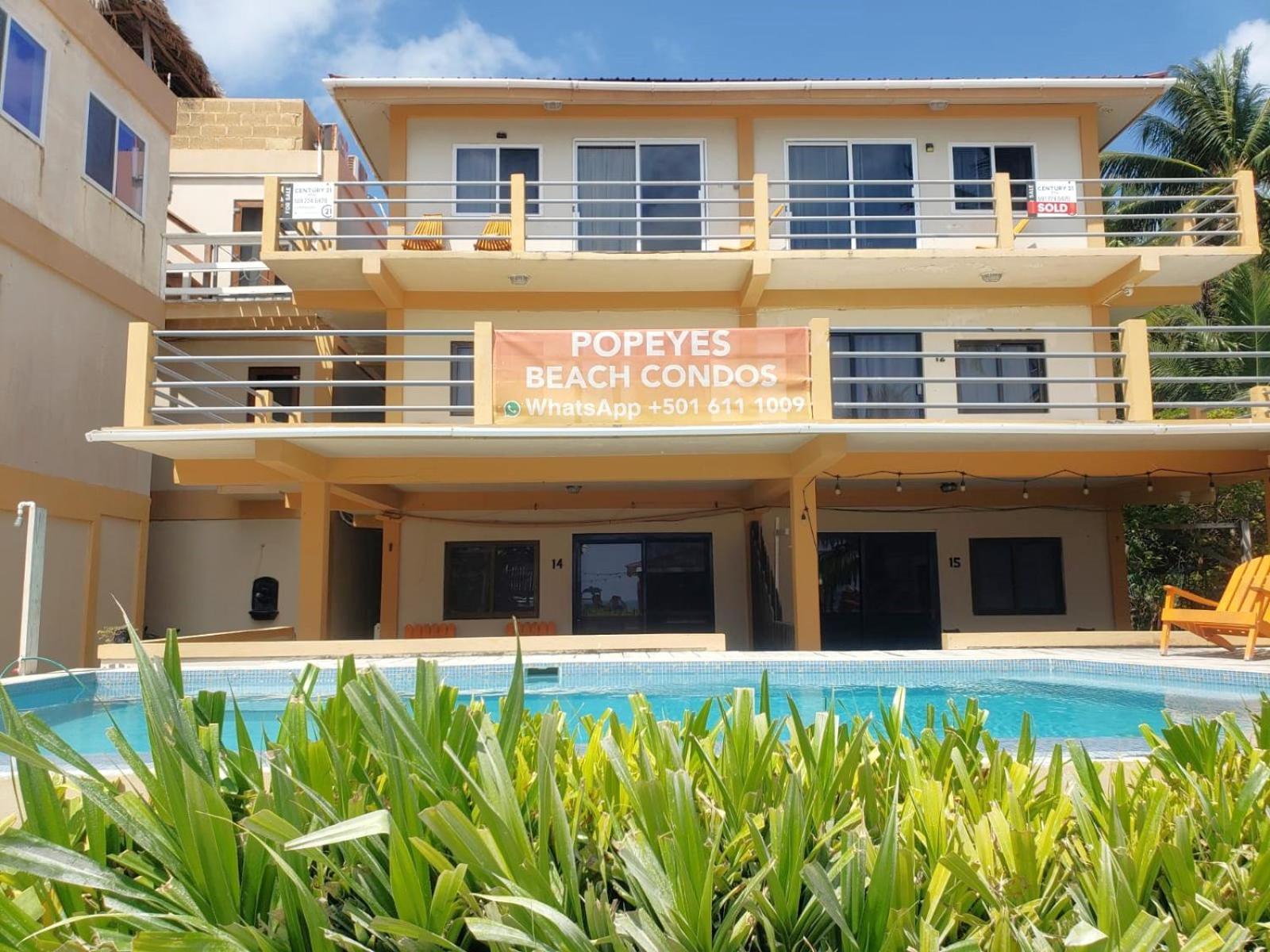 Beach Club Budget Rooms At Popeyes Caye Caulker Esterno foto